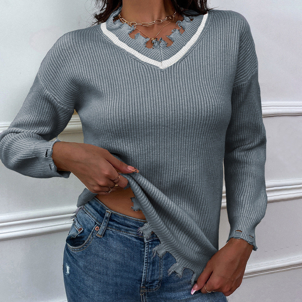 Reyna - Stylish v-neck sweater with ragged details