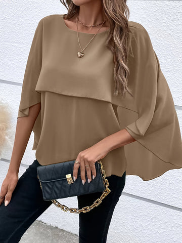 Arah - Elegant layered blouse with batwing sleeves